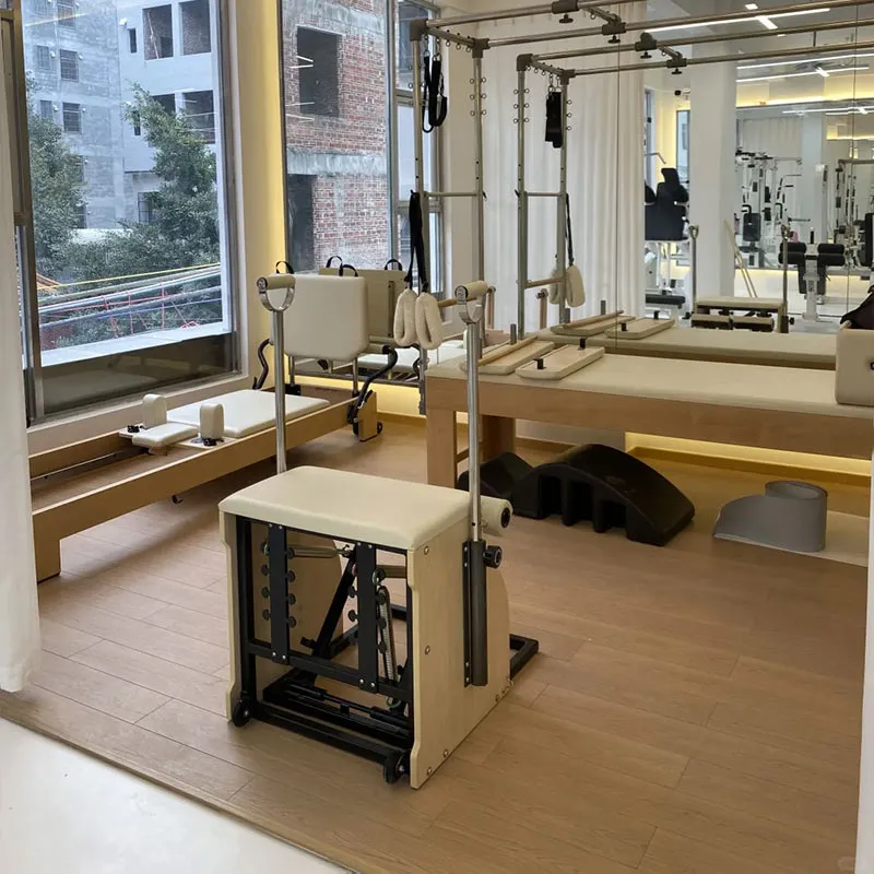How to Choose Between a Wood and Aluminum Pilates Reformer?